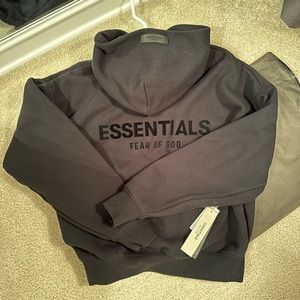 This is a new essentials hoodie (tags attached). Men’s size XS (Women’s- small)